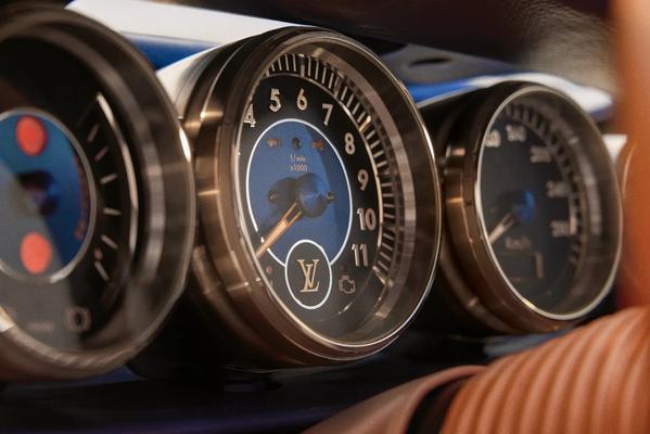 Louis Vuitton Tambour-inspired mechanical clock set into the Singer dashboard instruments